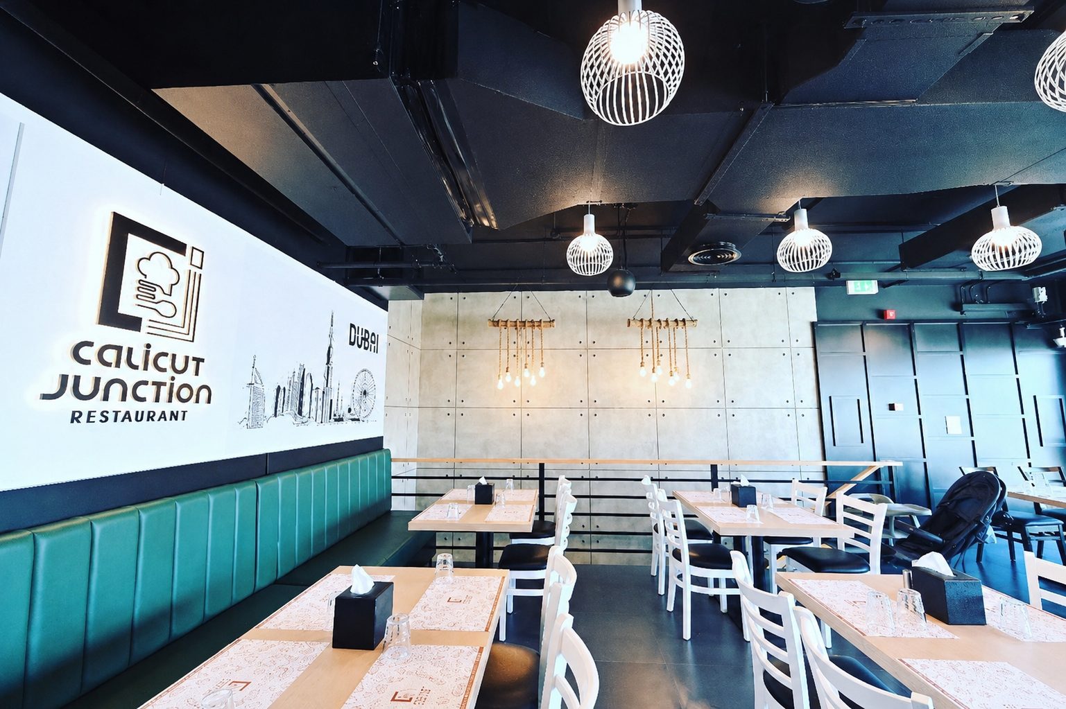 Restaurant dining interior with decorative pendant lighting